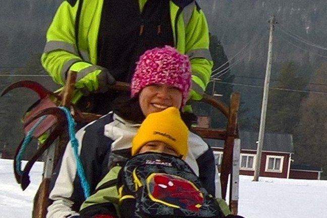 a person riding on the back of a motorcycle