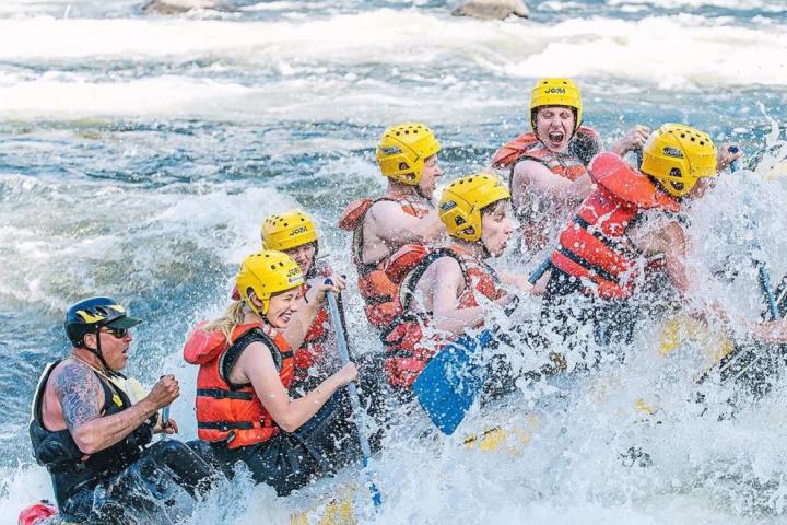 a man riding a wave on a surfboard in the water