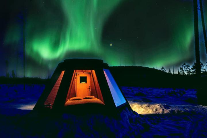 a person sitting in a dark room