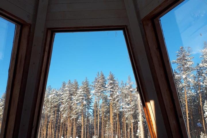 a bedroom with a large window