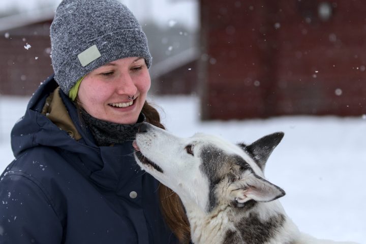 a person holding an animal